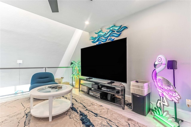 living area with vaulted ceiling