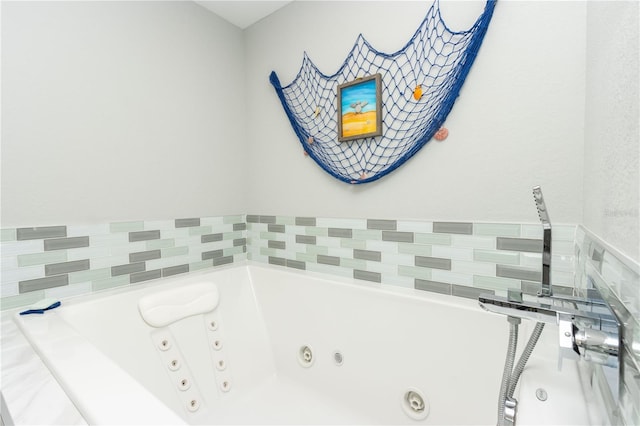 bathroom with a jetted tub