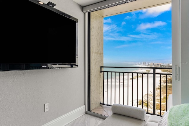balcony featuring a water view