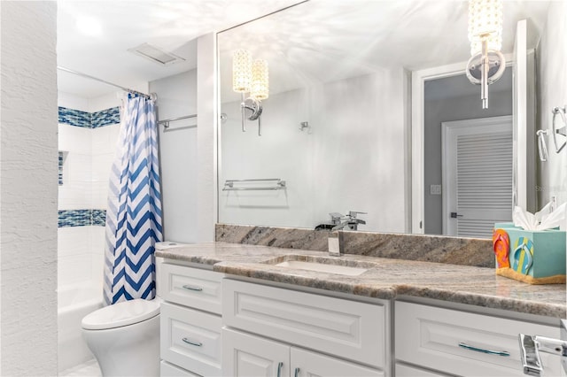bathroom with vanity, toilet, and shower / bath combination with curtain