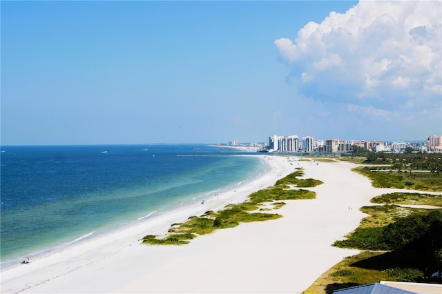 water view featuring local beach and nearby urban area
