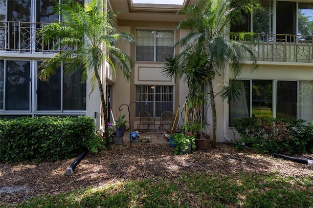 19029 US Highway 19 N Unit 2-12, Clearwater, FL 33764 - doorway to property with stucco siding