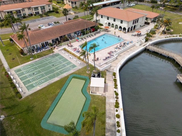 19029 US Highway 19 N Unit 2-12, Clearwater, FL 33764 - drone / aerial view of a pool and a nearby body of water