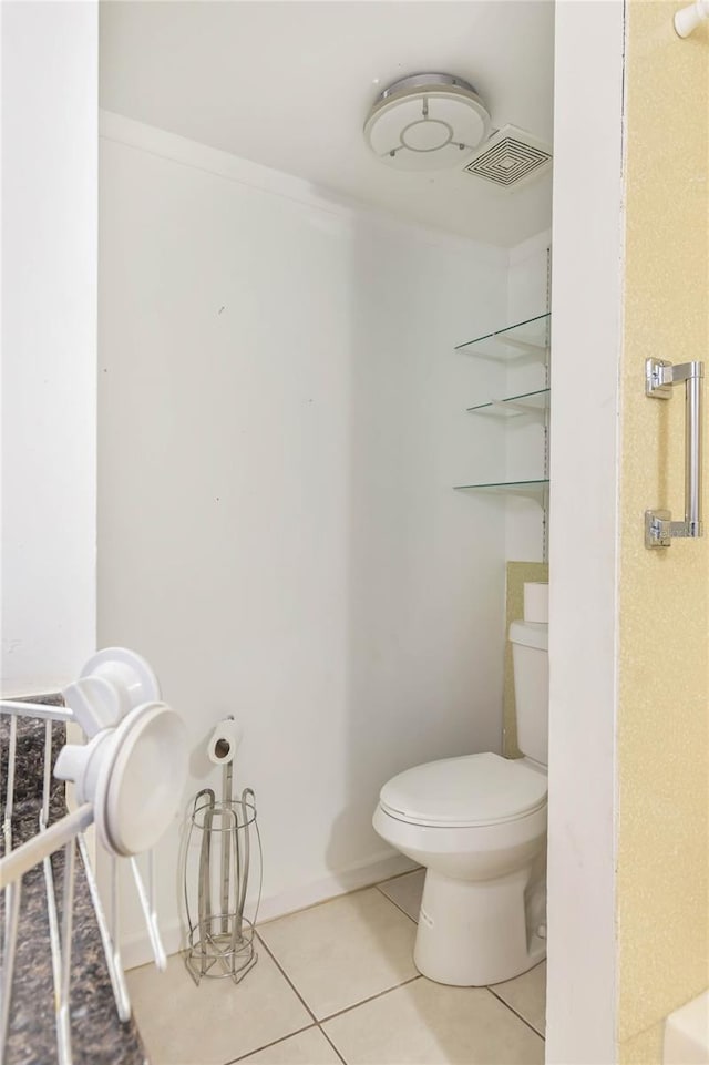 19029 US Highway 19 N Unit 2-12, Clearwater, FL 33764 - bathroom featuring tile patterned floors and toilet