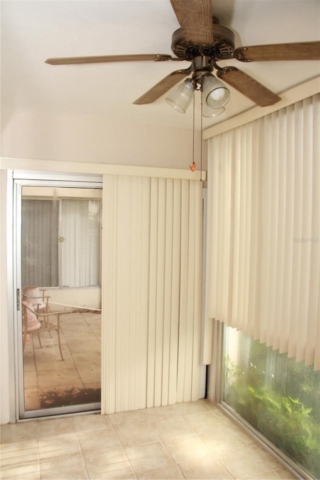 19029 US Highway 19 N Unit 2-12, Clearwater, FL 33764 - unfurnished room featuring ceiling fan and tile patterned flooring