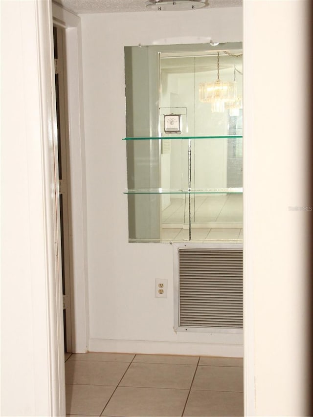 19029 US Highway 19 N Unit 2-12, Clearwater, FL 33764 - laundry area with tile patterned floors