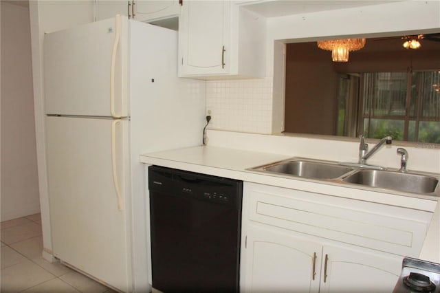 19029 US Highway 19 N Unit 2-12, Clearwater, FL 33764 - kitchen with dishwasher, a sink, light tile patterned floors, white cabinets, and light countertops