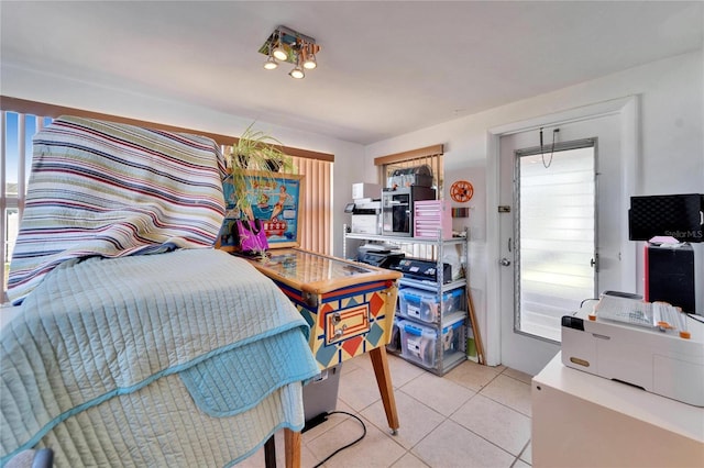 2533 Limewood Dr, Holiday, FL 34690 - bedroom with light tile patterned flooring