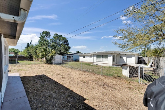 2533 Limewood Dr, Holiday, FL 34690 - fenced backyard featuring a storage shed