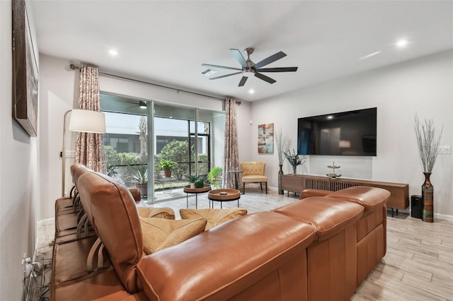 19398 Great Intention Way, Lutz, FL 33558 - living area featuring ceiling fan, baseboards, visible vents, and recessed lighting