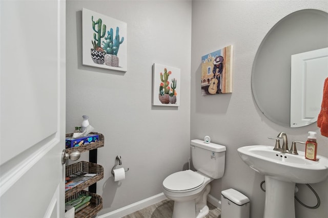 19398 Great Intention Way, Lutz, FL 33558 - bathroom with wood finished floors, toilet, and baseboards