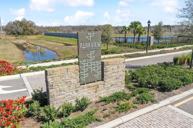 19398 Great Intention Way, Lutz, FL 33558 - community / neighborhood sign with fence and a water view