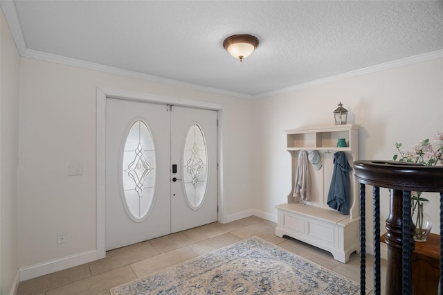 378 Tennessee Ave, Crystal Beach, FL 34681 - foyer entrance featuring light tile patterned floors, crown molding, baseboards, and a textured ceiling
