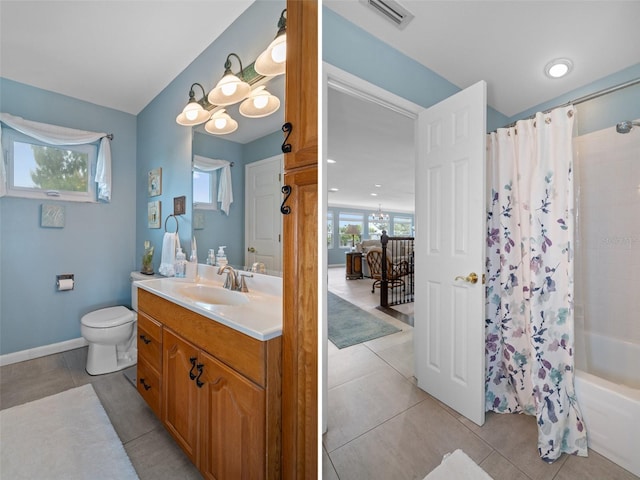 378 Tennessee Ave, Crystal Beach, FL 34681 - full bath featuring tile patterned floors, a wealth of natural light, and shower / bath combo with shower curtain