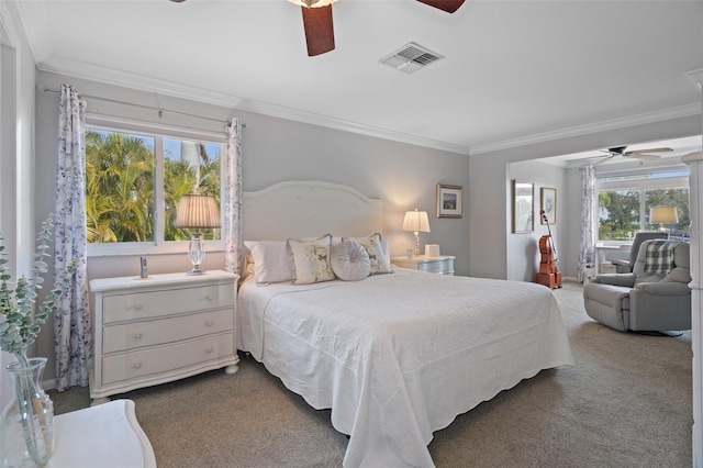 378 Tennessee Ave, Crystal Beach, FL 34681 - bedroom featuring visible vents, crown molding, ceiling fan, and carpet