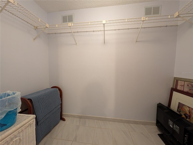 walk in closet featuring visible vents