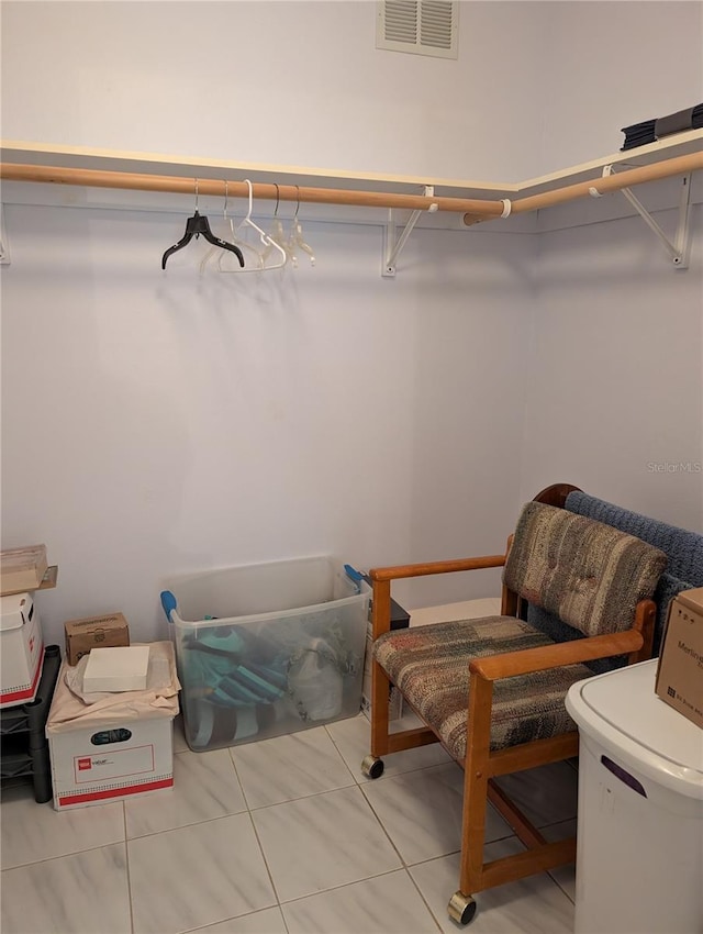 walk in closet with visible vents