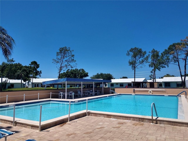 community pool featuring a patio
