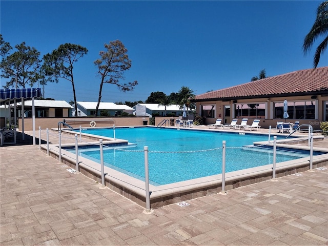 pool featuring a patio area