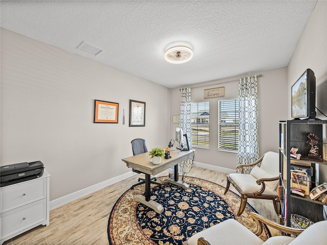 12808 Boggy Creek Dr, Riverview, FL 33579 - office space with baseboards, light wood-type flooring, and visible vents