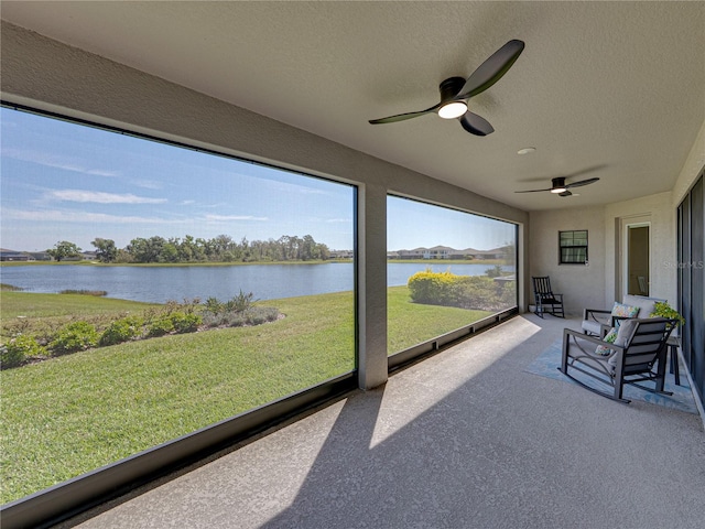 12808 Boggy Creek Dr, Riverview, FL 33579 - sunroom / solarium featuring a water view and ceiling fan