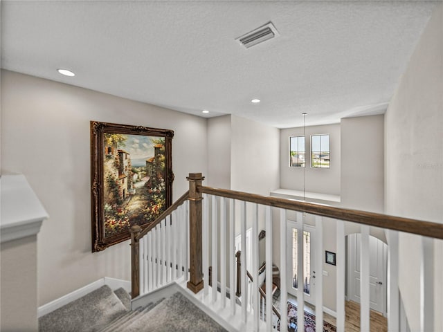 12808 Boggy Creek Dr, Riverview, FL 33579 - stairway with recessed lighting, a textured ceiling, baseboards, and visible vents