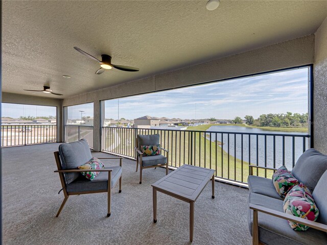 12808 Boggy Creek Dr, Riverview, FL 33579 - view of patio with a balcony, an outdoor hangout area, a water view, and a ceiling fan