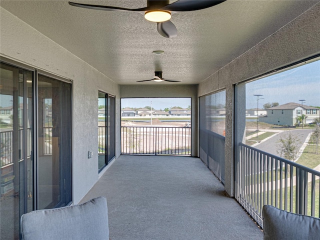 12808 Boggy Creek Dr, Riverview, FL 33579 - balcony with a ceiling fan and a residential view