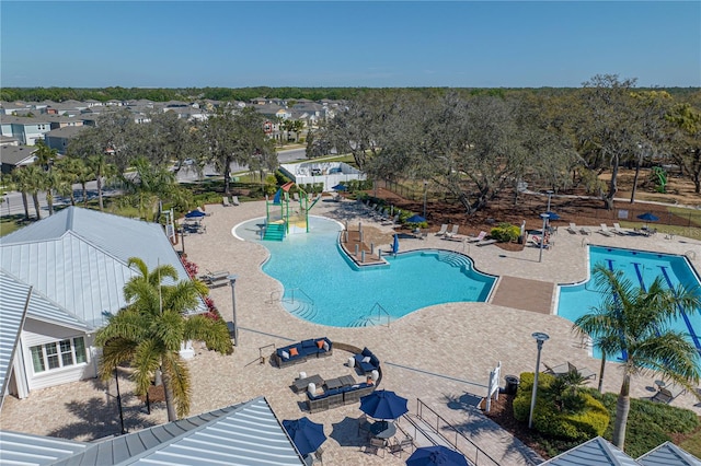 12808 Boggy Creek Dr, Riverview, FL 33579 - community pool featuring a water slide and a patio area