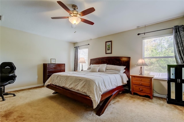 4250 Warwick Hills Dr, Wesley Chapel, FL 33543 - bedroom with light carpet, baseboards, and a ceiling fan