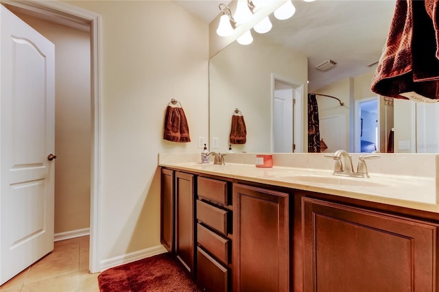 4250 Warwick Hills Dr, Wesley Chapel, FL 33543 - full bath featuring tile patterned flooring, double vanity, a shower with shower curtain, and baseboards
