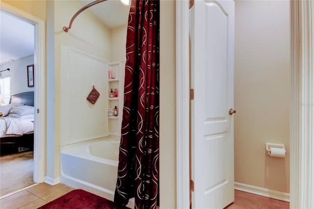 4250 Warwick Hills Dr, Wesley Chapel, FL 33543 - full bath featuring tile patterned flooring, shower / bath combination with curtain, ensuite bathroom, and baseboards