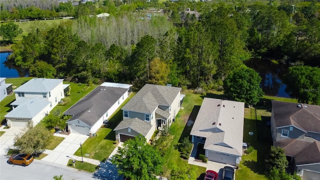 4250 Warwick Hills Dr, Wesley Chapel, FL 33543 - aerial perspective of suburban area featuring a large body of water