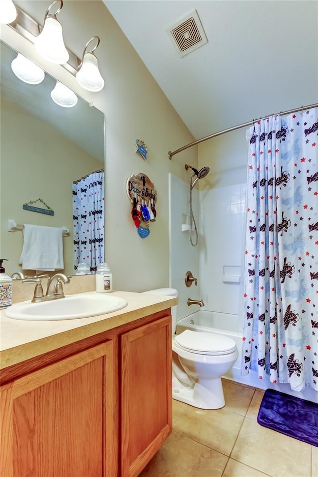 4250 Warwick Hills Dr, Wesley Chapel, FL 33543 - bathroom with tile patterned floors, shower / bath combo with shower curtain, toilet, vanity, and lofted ceiling