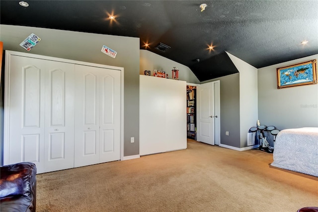 4250 Warwick Hills Dr, Wesley Chapel, FL 33543 - carpeted bedroom featuring vaulted ceiling, baseboards, and a closet