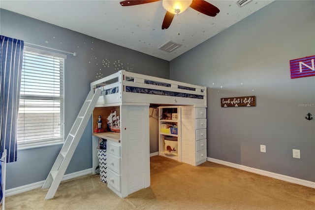 4250 Warwick Hills Dr, Wesley Chapel, FL 33543 - bedroom featuring light colored carpet, vaulted ceiling, baseboards, and ceiling fan