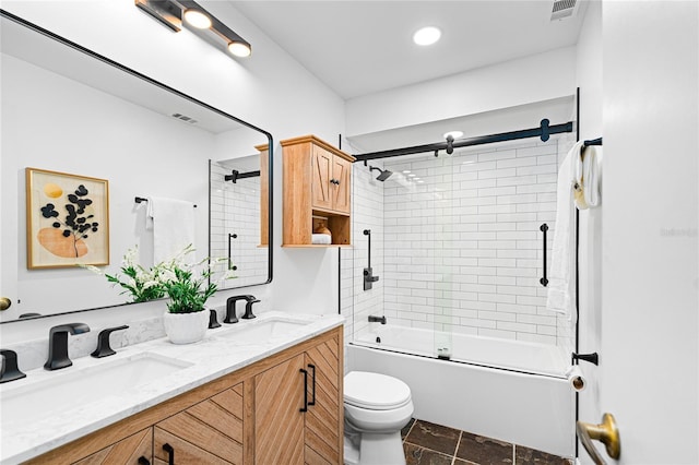 408 S Arrawana Ave Unit B4, Tampa, FL 33609 - bathroom featuring stone finish floor, visible vents, enclosed tub / shower combo, a sink, and double vanity