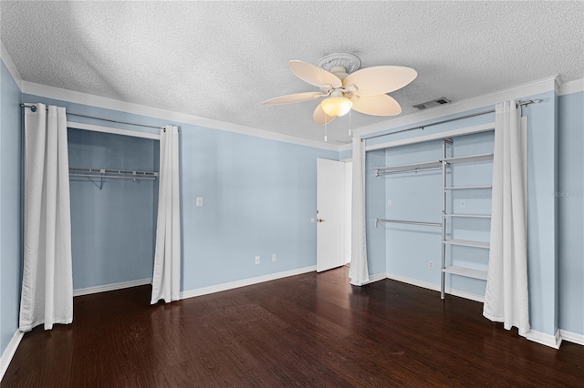408 S Arrawana Ave Unit B4, Tampa, FL 33609 - unfurnished bedroom featuring a textured ceiling, a ceiling fan, and wood finished floors