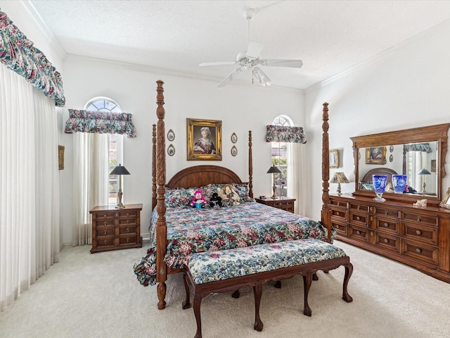 bedroom featuring light carpet, ceiling fan, and ornamental molding