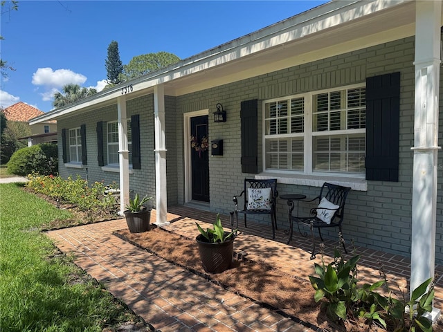 3316 S Shamrock Rd, Tampa, FL 33629 - view of patio featuring a porch