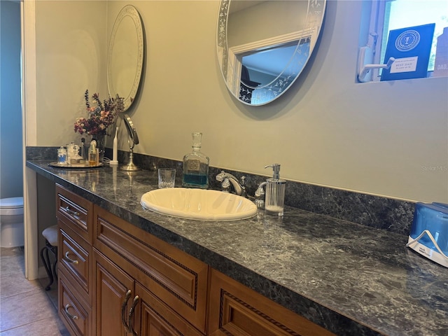 3316 S Shamrock Rd, Tampa, FL 33629 - bathroom featuring toilet, vanity, and tile patterned flooring