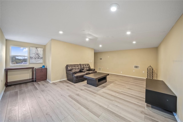 8833 Bel Meadow Way, Trinity, FL 34655 - living room with recessed lighting, baseboards, light wood-type flooring, and visible vents