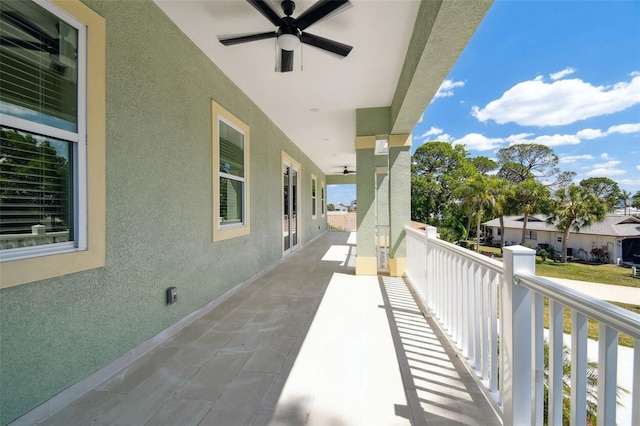 4559 Mitcher Rd, New Port Richey, FL 34652 - balcony featuring a ceiling fan