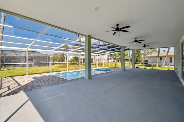 4559 Mitcher Rd, New Port Richey, FL 34652 - view of patio / terrace with ceiling fan, an outdoor pool, and glass enclosure