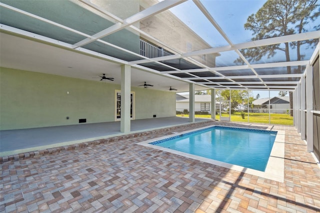 4559 Mitcher Rd, New Port Richey, FL 34652 - swimming pool with a ceiling fan, a patio, and a lanai