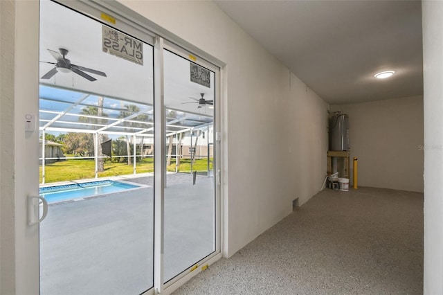 4559 Mitcher Rd, New Port Richey, FL 34652 - corridor with a sunroom, speckled floor, healthy amount of natural light, and electric water heater