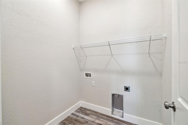 4559 Mitcher Rd, New Port Richey, FL 34652 - laundry room with wood finished floors, hookup for a washing machine, and hookup for an electric dryer