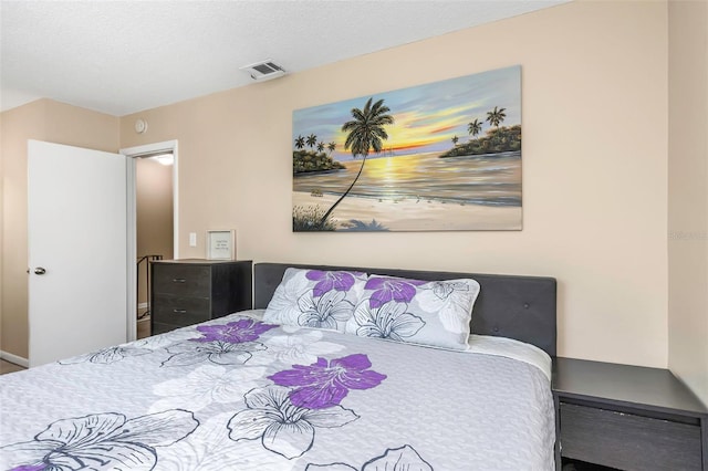 bedroom with visible vents