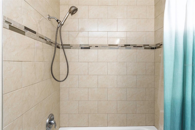 full bath featuring shower / tub combo