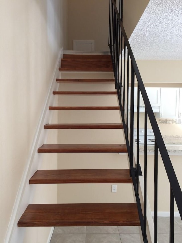 1830 Bough Ave Unit 2, Clearwater, FL 33760 - stairway featuring tile patterned floors